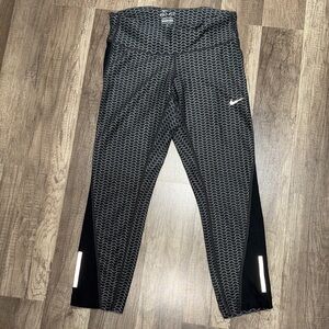 Nike Dri-fit Running Capri tights - Women size: XS. Used a bit. Selling as is.